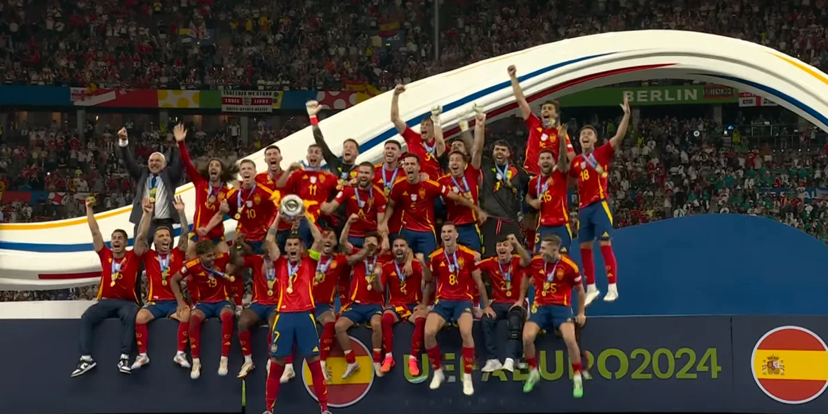Spain's Fermin Lopez celebrates with the trophy and teammates after winning Euro 2024 -Video Screenshot