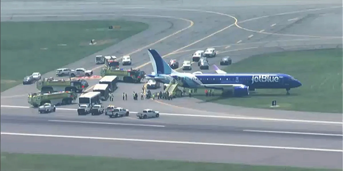 JetBlue plane at Boston Logan rolls off runway / Video Screenshot